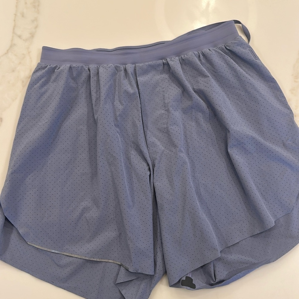 Lulelemon running shorts. 6” inseam. Liner. Light purple.